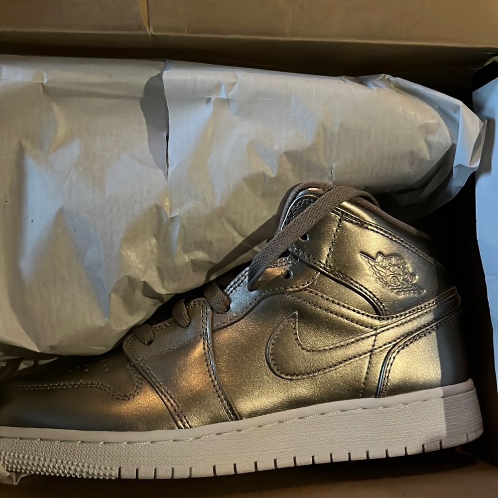 Gold Jordan’s  Never worn